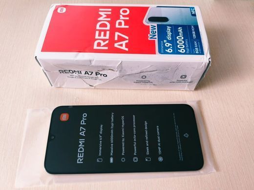 Смартфон Xiaomi Redmi A7 Pro 4/128GB Sunset Orange NFC (уцінка), Жовтий