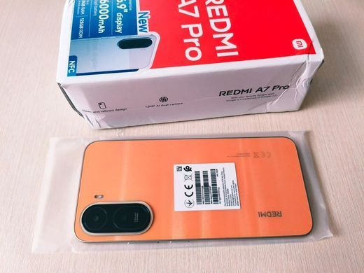 Смартфон Xiaomi Redmi A7 Pro 4/128GB Sunset Orange NFC (уцінка), Жовтий